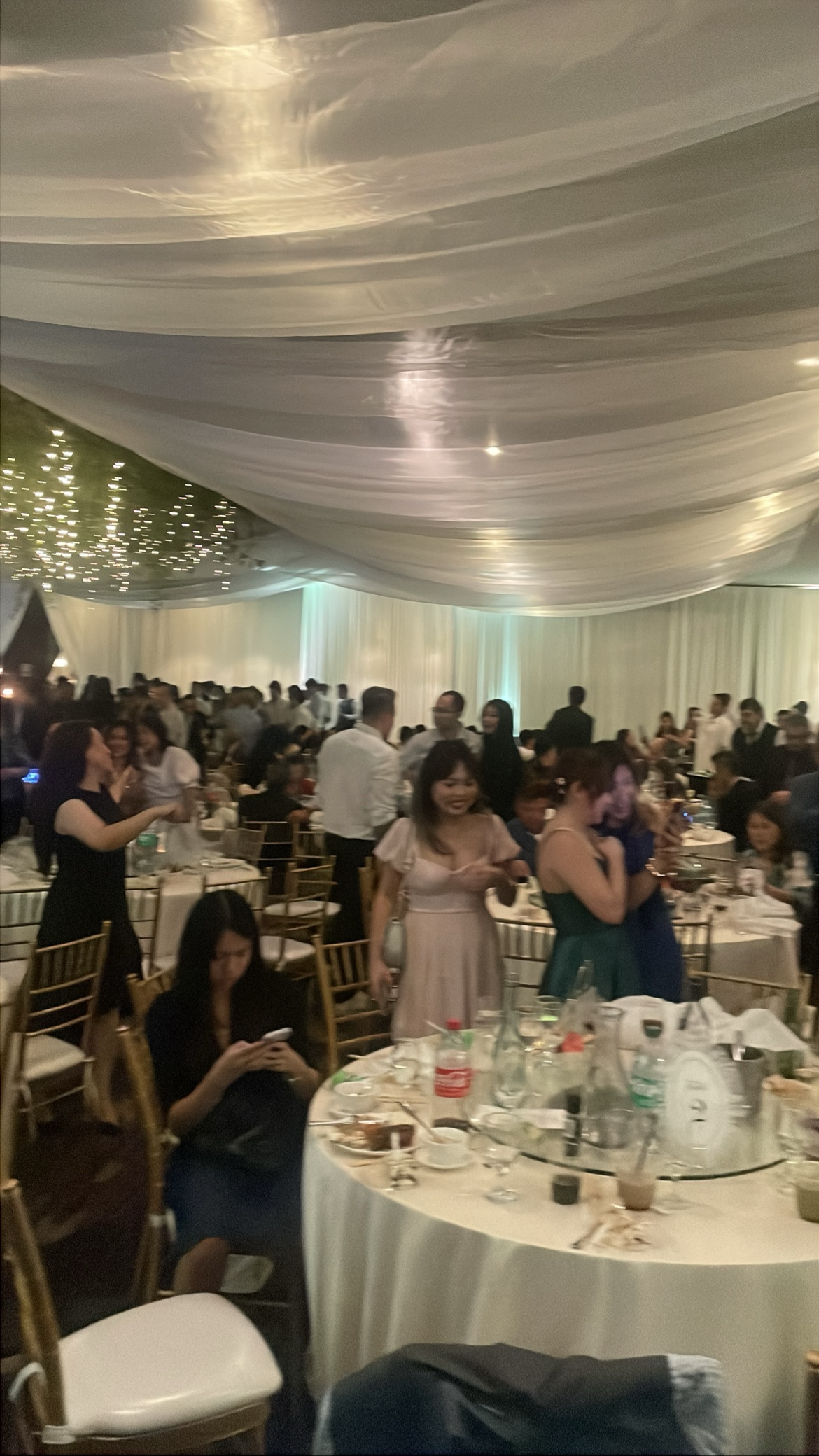 Wedding crowd celebrating on the dance floor